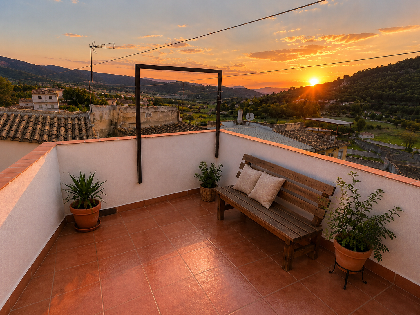 Terraza exterior al atardecer con vistas abiertas
